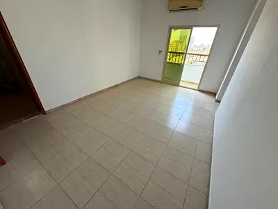 1BHK apartment for yearly rent in Al Rashidiya 2 Ajman at a great price of AED 24K in 6 payments, fully bright unit with 2 balconies, good ventilation