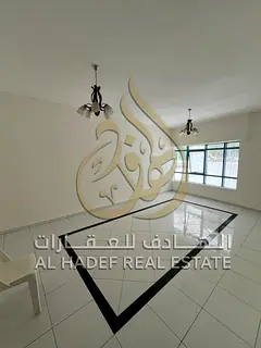 Spacious 2 Bedrooms + Hall for Rent in Al Khan – Sharjah! Family Building – Built-in Wardrobes 