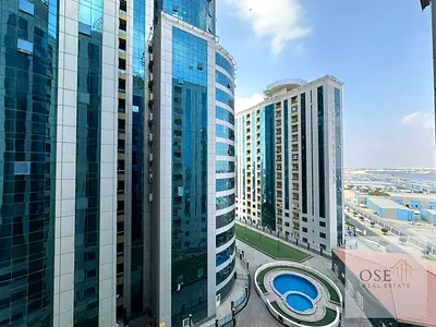 Own a one-bedroom apartment in Orient Tower with a down payment of 50,000 dirhams.