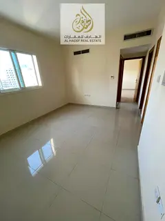 Annual rent in Ajman, Al Rashidiya 3 area, opposite Ajman One Towers, near the Corniche. The buildin