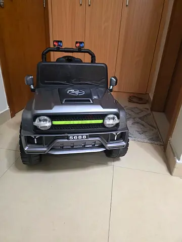 Green Electric Ride-On Toy Car for Kids - Working Lights with remote control