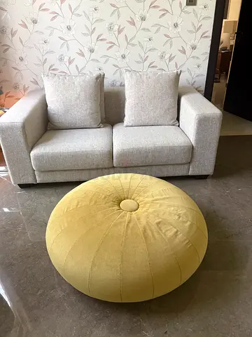 THE ONE large mustard yellow floor pouffe