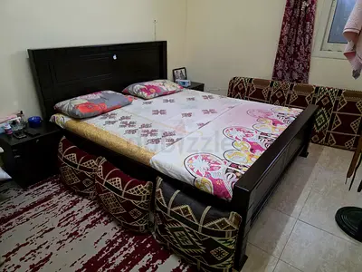 Dark Wood King Bed Frame with Headboard and Matching Nightstand (Used)