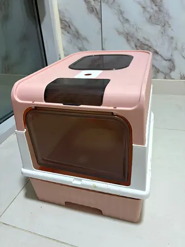 Plastic enclosed cat litter box with hood - pink, used
