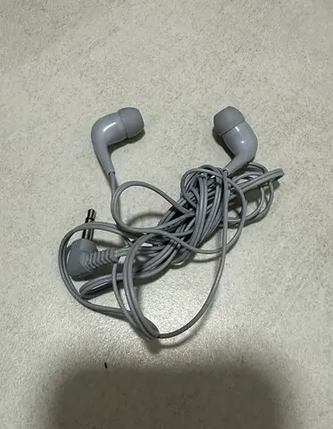 Used wired in-ear earphones with 3.5mm jack — good working condition