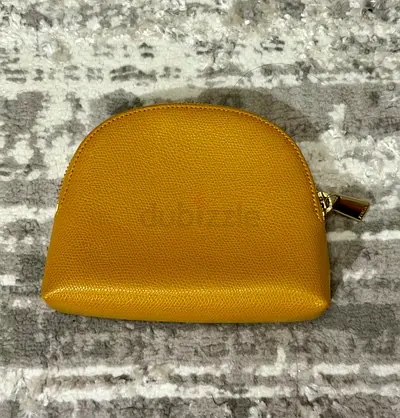 Small mustard yellow leather coin purse with zip