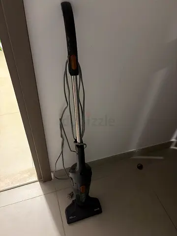 Lightweight stick vacuum cleaner - used, works well. Other cleaning mops and brushes