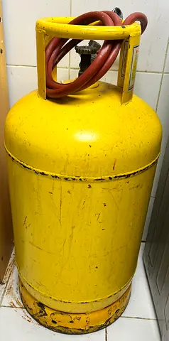 Yellow gas cylinder
