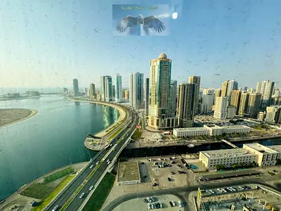 Free air conditioning | Parking, gym & swimming pool | Open view of Al Qasba | Near Dubai exit | On Al Khan Beach