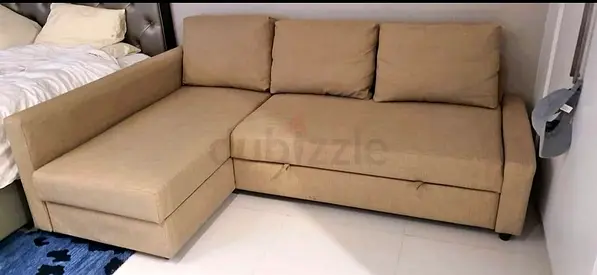 Ikea L shape sofa store cum bed and you can fix the storage lift or right