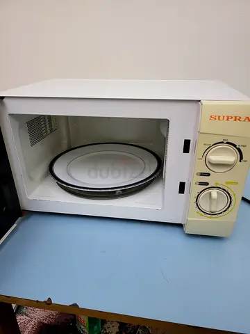 Microwave OVEN Supra Standard size -spacious-working perfectly