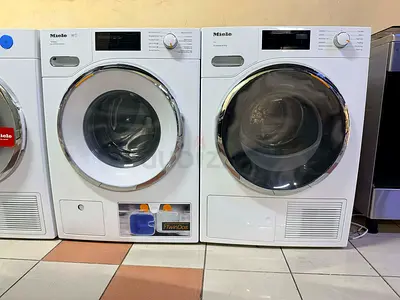 Miele latest model twin dose technology washer dryer set
