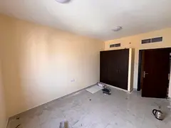 Two-bedroom apartment with a living room for annual rent in Al Nuaimiya 1, Ajman – balcony, 2 bath