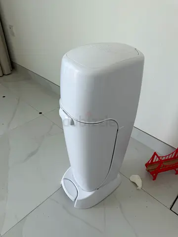 Diaper genie with refill
