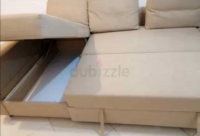 Ikea L shape sofa store cum bed and you can fix the storage lift or right