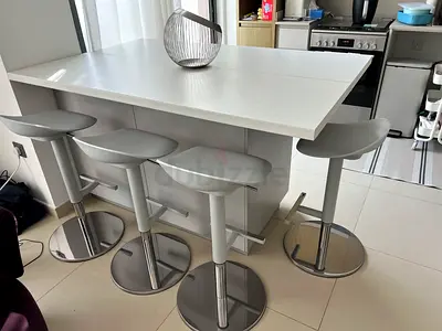 Modern white kitchen island from Ikea. Storage 2 doors. Used less than 1 year. Chairs NOT included