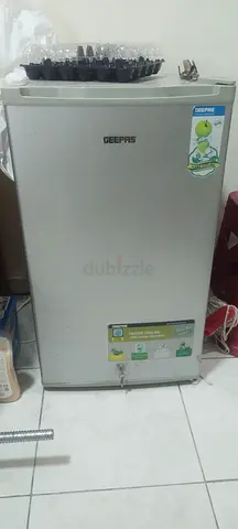 Small single-door minibar fridge - used, good working condition
