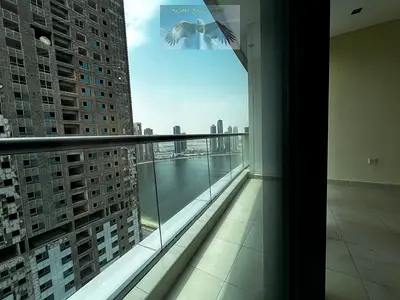 Sea view, free parking, two bedrooms, annual rent in Al Khan, free gym and swimming pool, first exit to Dubai