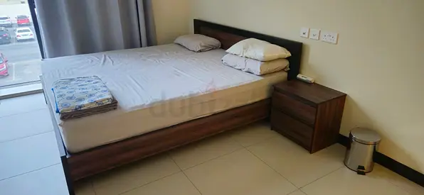 King size  wooden bed frame with mattress . dresser and bedside table - good condition