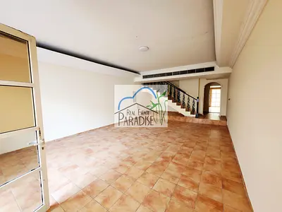 Available away from fly zone private entrance/3 Bedrooms Villa / private back lawn / maids room/ covered parking for 3 / available for Rent in Mirdif