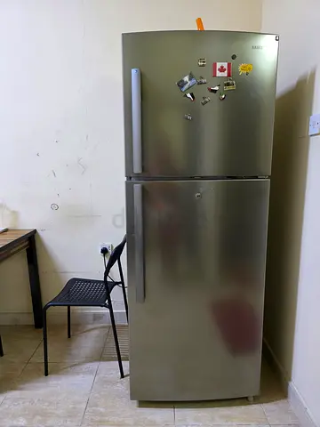 Used stainless steel double-door refrigerator - good working condition