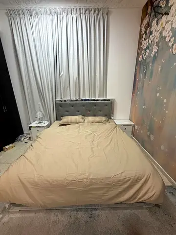 Queen bed frame with headboard and bedside tables - used