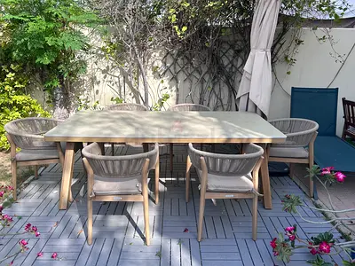 Outdoor teak-style dining table with 6 chairs - good condition. Hesperide from ACE.