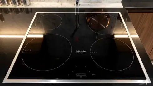 Miele induction cooking top with built in oven