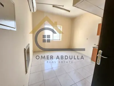 Spacious Studio Apartment with Closed Kitchen | Family-Friendly | Prime Location in Muwaileh