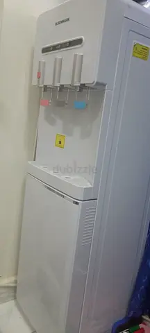 Standing hot and cold water dispenser — good working condition
