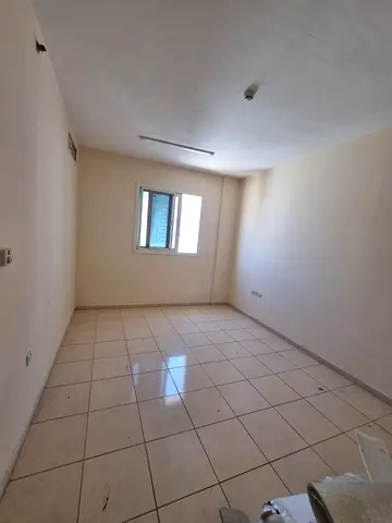 For rent in Al Qulayaa Sharjah 1 bedroom hall 2 bathrooms master room central AC price 34000 payment 4 or 6 deposit 2000 cash
