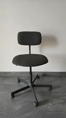 Ergonomic grey Office Chair with Wheels — Minimal Design