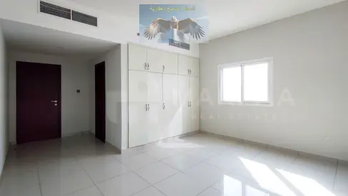 Free parking, two bedrooms and a living room with built-in wardrobes, easy access to Dubai, spacious area for annual rent in Al Nahda, Sharjah