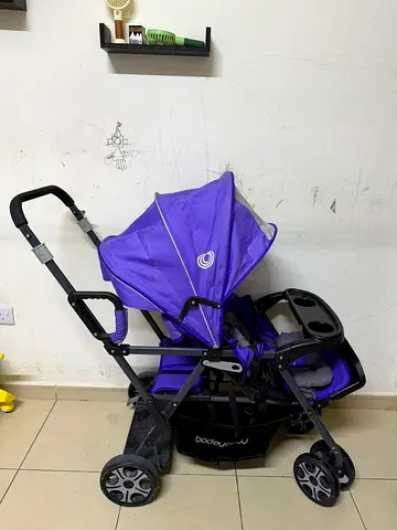 Purple double stroller / tandem stroller in good used condition