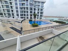 Modern 1-bedroom apartment with a living room available for rent in "Ajmal Makan" compound