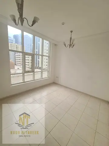 Apartment for annual rent in Al Majaz, 1 bedroom and living room, 2 bathrooms, central air conditio
