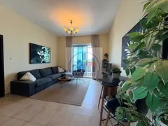 NEW TOWER NICELY FURNISHED TWO BHK WITH BALCONY WITH PART SEA VIEW HIGHT FLOOR AND PARKING