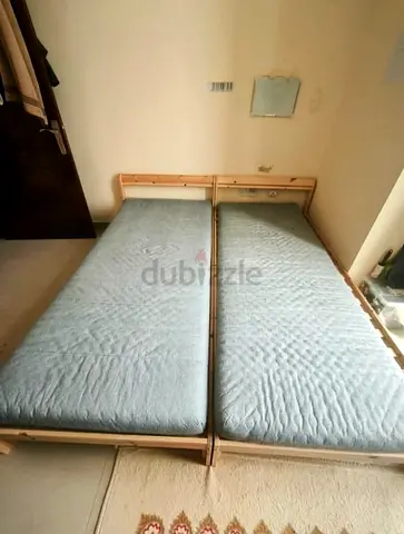 Ikea neiden pine bed frame with Ikea firm foam mattress is available