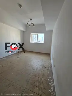 Studio for annual rent in Ajman Al Nuaimiya 2, built-in wardrobes, equipped kitchen, free gym, free