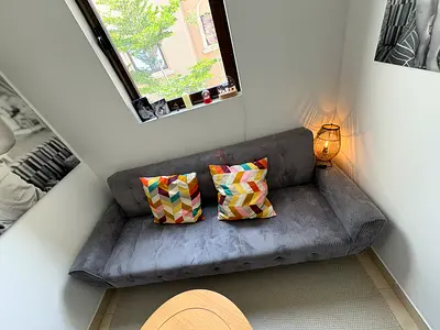 Grey 3-seater bed sofa / futon in very good condition