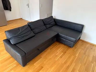 Black L-shaped Leather Sofa — Good Condition