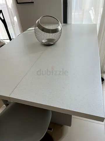 Modern white kitchen island from Ikea. Storage 2 doors. Used less than 1 year. Chairs NOT included
