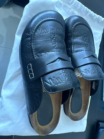 Black Leather Slip-On Clogs with Embossed Branding - Size Unknown