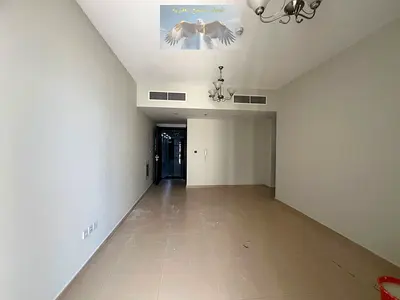 Two-bedroom apartment for rent in Al Taawun . Includes wardrobes, open view, and parking. balcony
