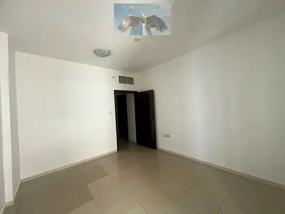 One bedroom and living room for rent in Al Taawun with free maintenance