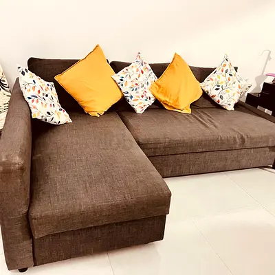 Brown L-shaped IKEA Sofa Bed with Left Chaise storage— Good Condition