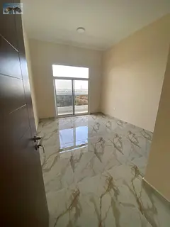 * 2-bedroom apartment with living room * Located in Al Mowaihat 3 area * Near The International Scho