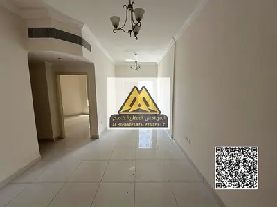 This spacious and practical apartment is ideal for families. It features two bedrooms, a living room with a balcony, and two bathrooms, all with centr