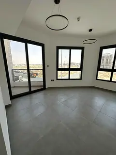 Brand new 2-bedroom apartment in Tilal City | First occupancy | 2 balconies | Luxury finishes | Buil