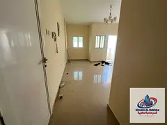 Studio for rent in Al Butina Sharjah, large semi-partitioned, balcony, central AC &amp; gas, sandy p